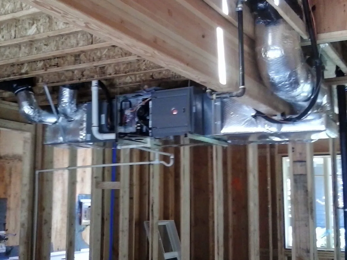 Horizontal air handler rough-in between floor joists in new construction