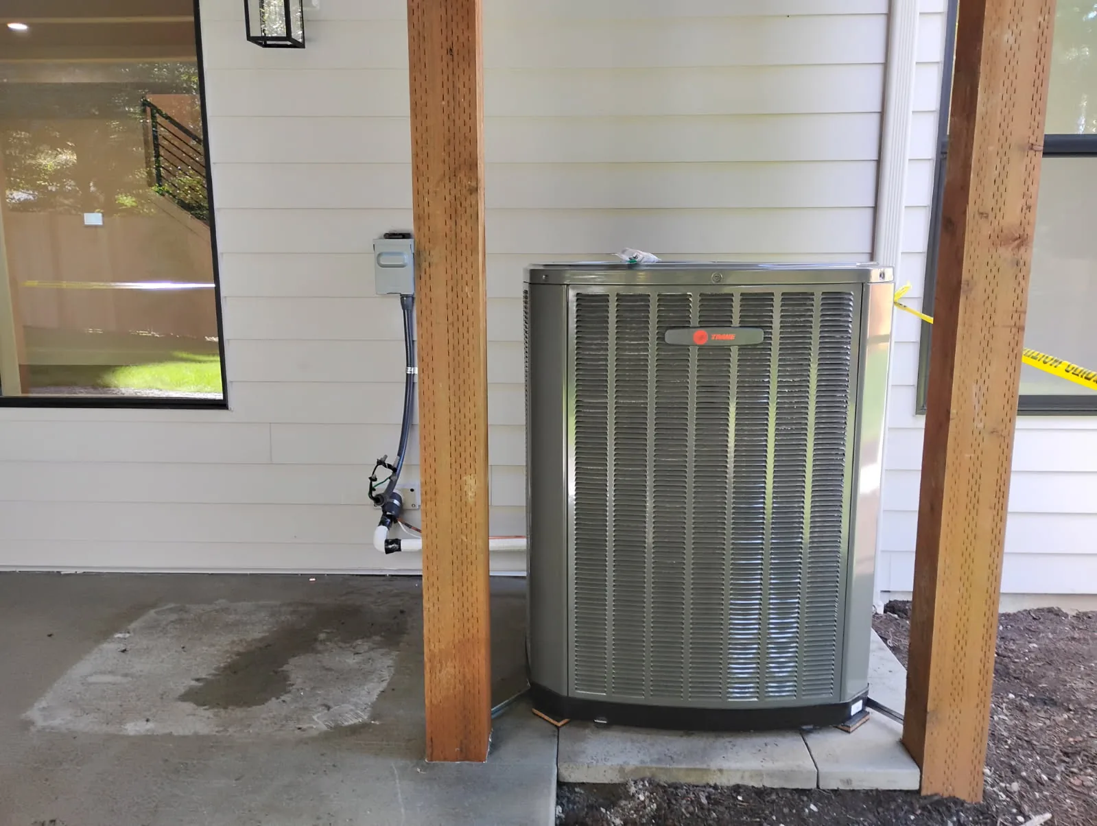 Trane outdoor unit on a new-construction home site